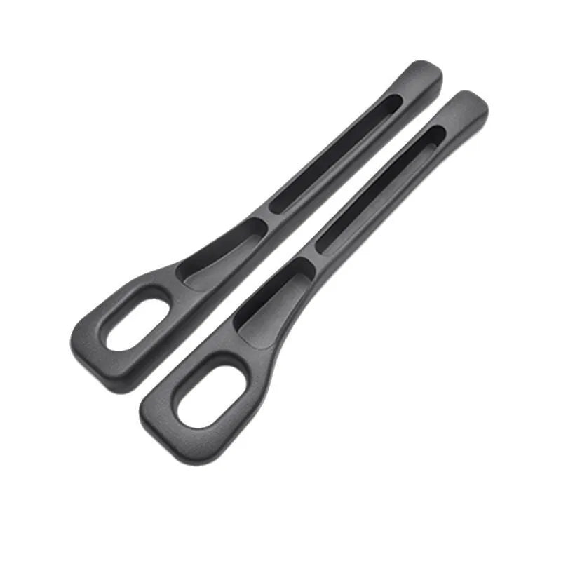 Black car seat gap filler installed between driver seat and centre console with leak-proof waterproof material