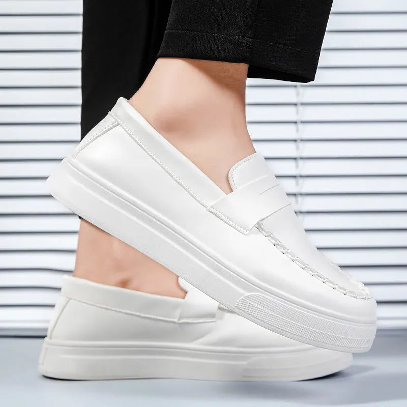 A pair of leather-style casual slip-on shoes with a round toe in a choice of colours.