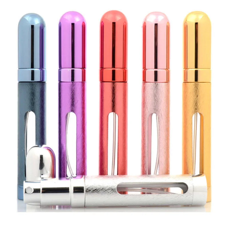 Slender 12ml aluminium portable perfume atomiser in six colours with a glass liner, shown next to a ruler indicating its 115mm height.