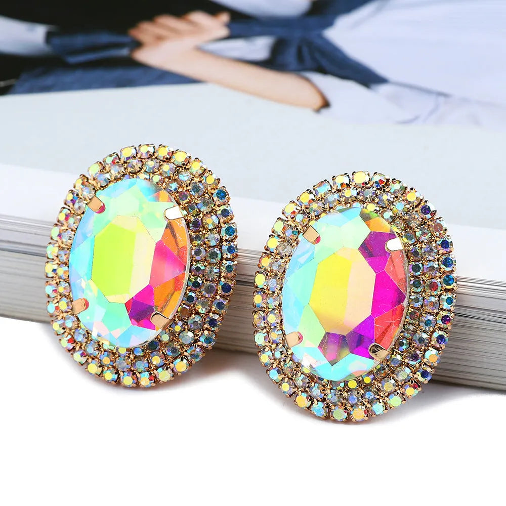 Women's oval rhinestone ear studs in eight colours including red, green, purple, black, white, pink, champagne, and AB finish