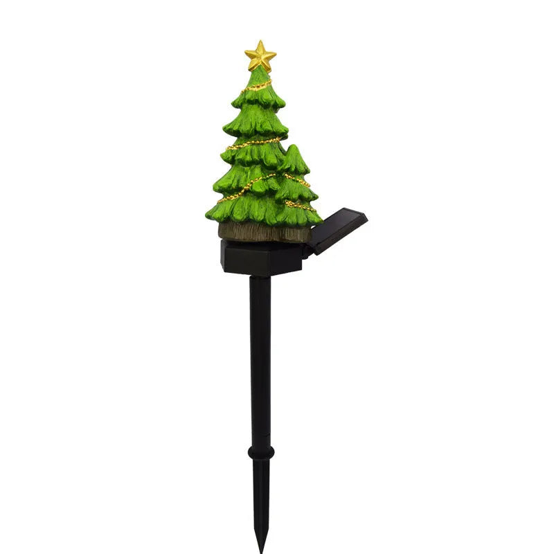 Solar powered Christmas tree shaped ground plugged lawn lamp with resin body and solar panel for outdoor garden decoration