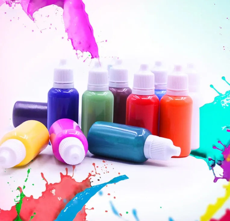 Hand painted doodle educational toy set with gouache paints, concentrated liquid, stirring rods, and drawing paper on a table