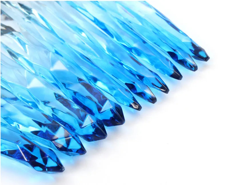 Set of ten clear crystal handle makeup brushes with diamond shank detail and artificial fibre bristles.