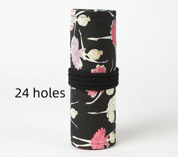 Canvas rolling pencil case with ballet girl print, showing multiple pencils organised in holes.