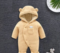 Baby cotton padded winter jumpsuit in marrón colour with long sleeves and feet coverings
