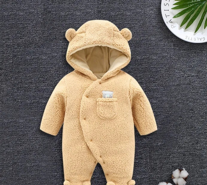 Baby cotton padded winter jumpsuit in marrón colour with long sleeves and feet coverings