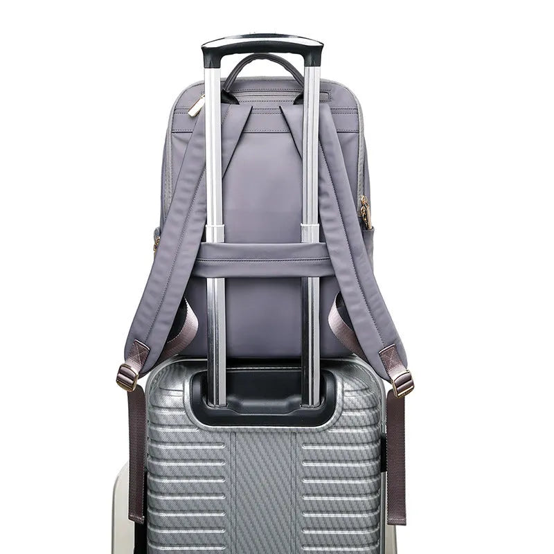 Oxford cloth women's backpack in black or purplish grey with large capacity and anti-theft design