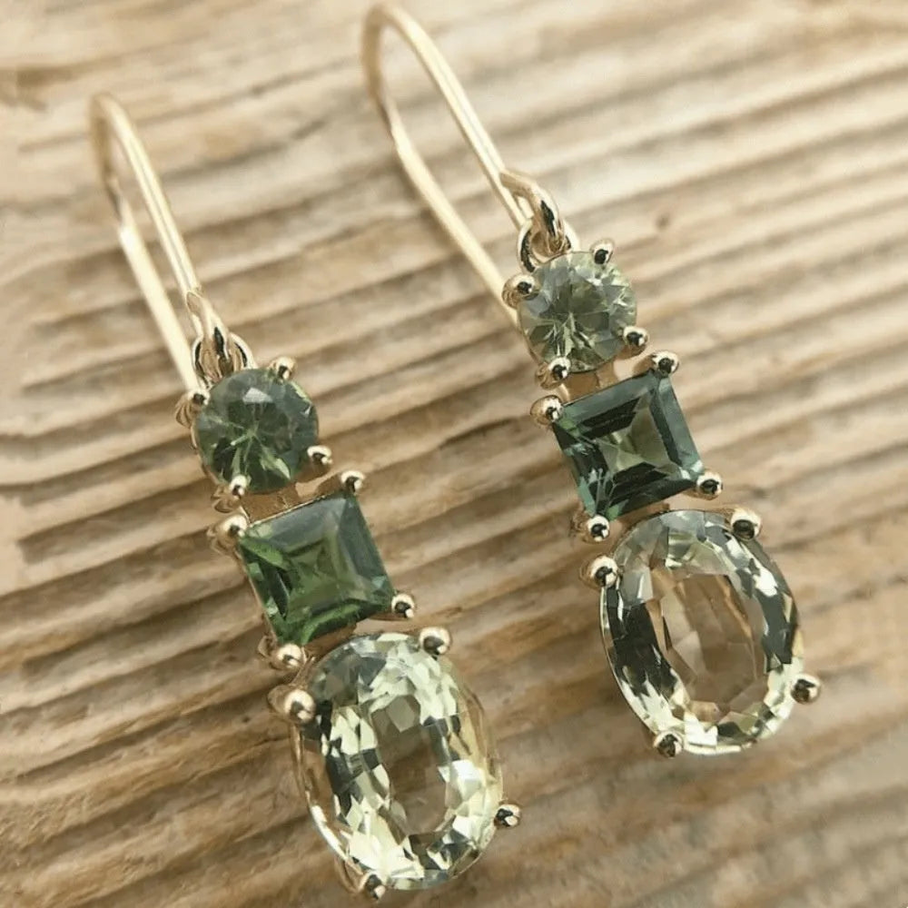 A pair of green geometric copper earrings with a quadrilateral shape and retro bohemian style.