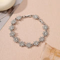 Zinc alloy electroplated flower bracelet with colourful crystal designs on wrist