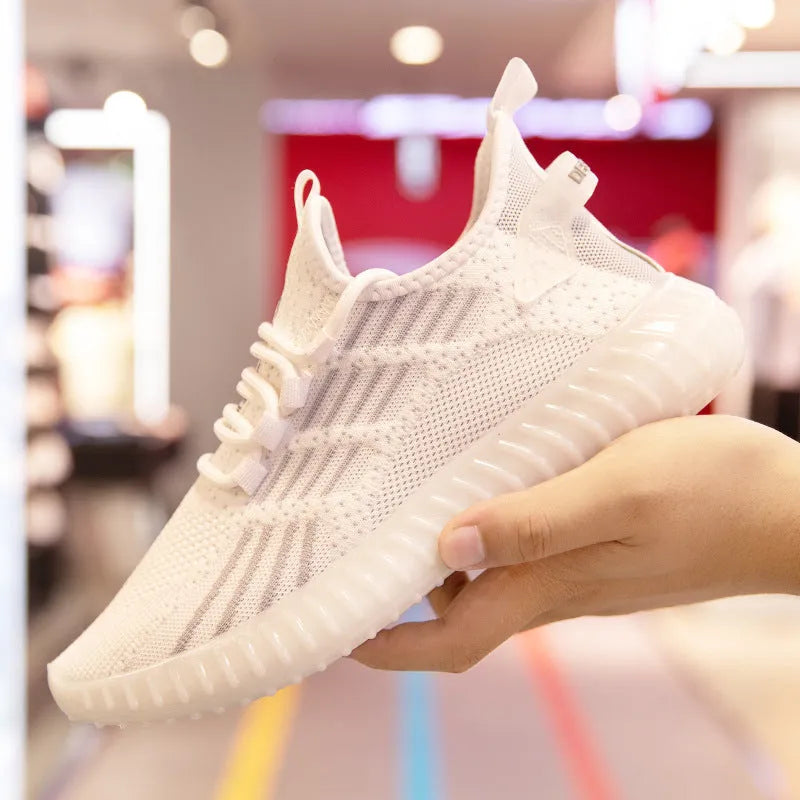 Men's white breathable flying fabric sports shoes with mesh lining and platform heel on a solid background