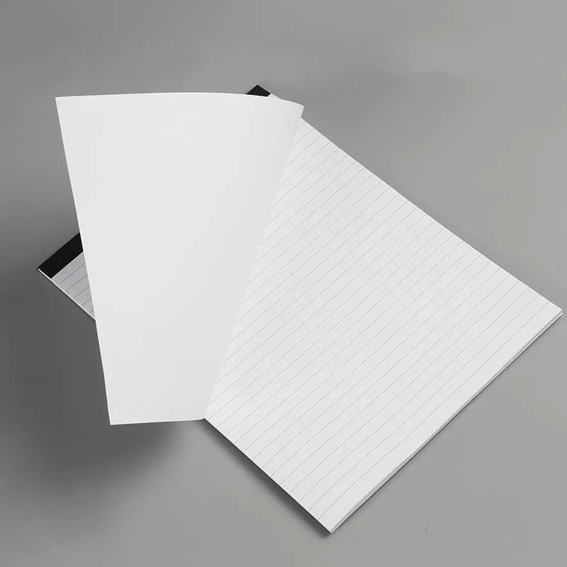 A4 paper cover notebook with grid-lined ivory pages and wireless adhesive binding.
