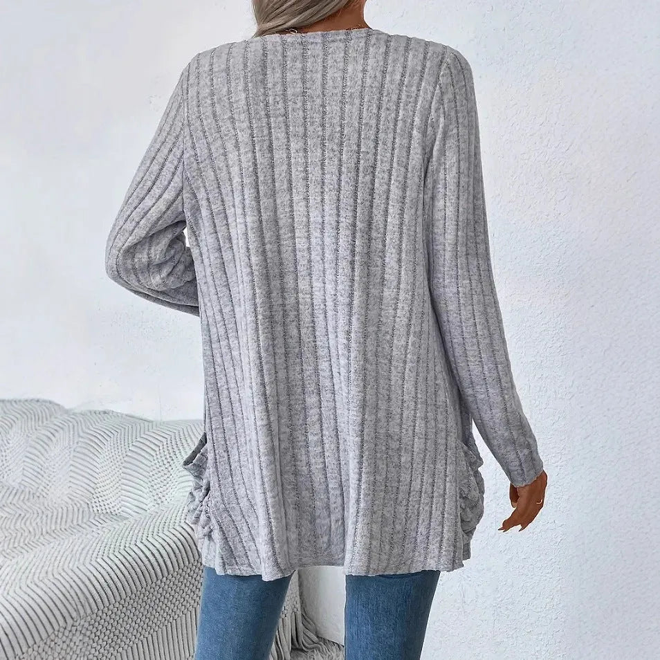 Solid colour long sleeve cardigan knitwear with front pockets in loose fit, available in black and granny grey