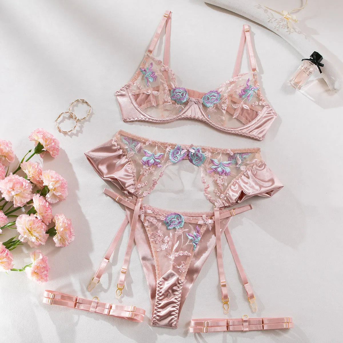 Light purple satin lingerie four-piece set with embroidery, shown with champagne colour option.