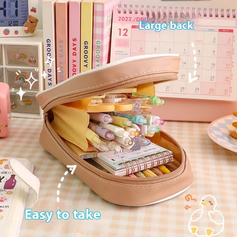 Large transparent PVC pencil case with a vertical cartoon dog design, zippered closure.