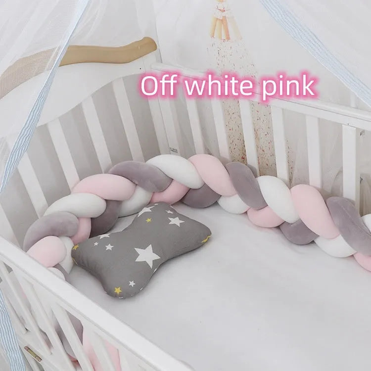 Long, flexible baby crib bumper pillow in spandex velvet, shown fitted around a white cot for safety protection.