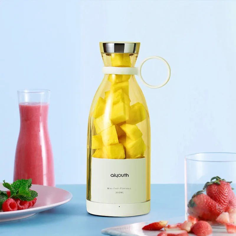 Portable handheld electric juicer with USB charging cable in pink or white colour options