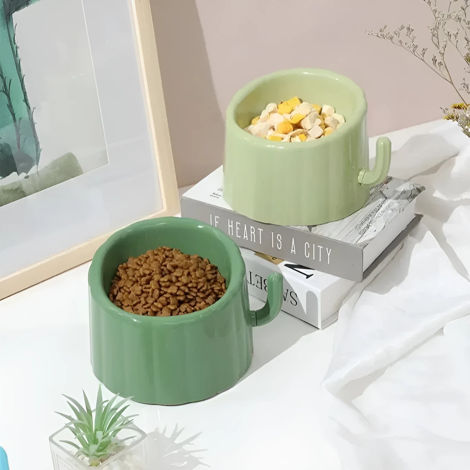 Dark green cactus design cat bowl with high-stand construction and weighted anti-slip base