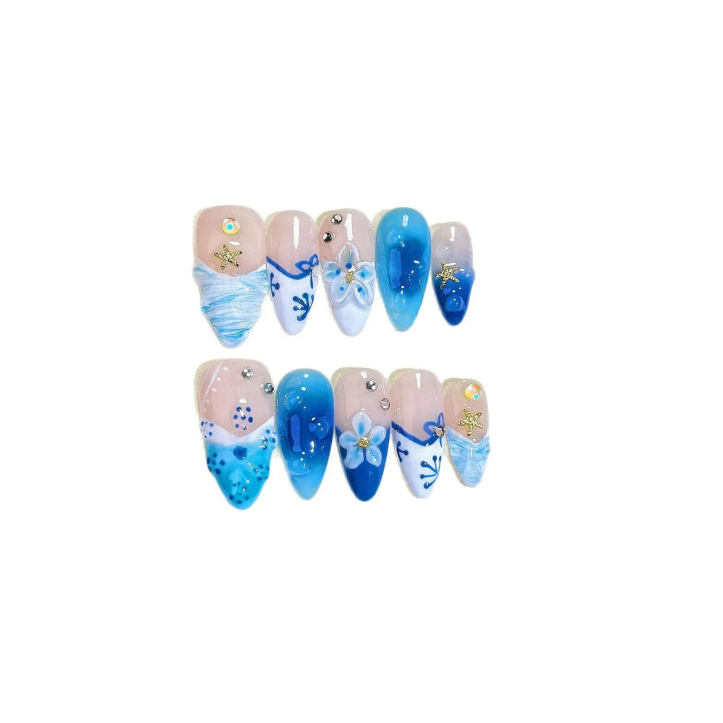 Blue false nails with hand-painted carved summer ice transparent design, shown in XS, S, M, L sizes.