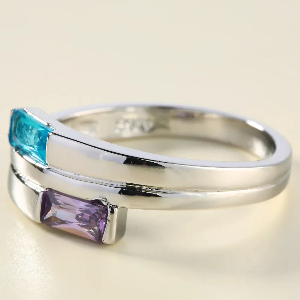 Silver colour copper electroplated ring with zircon inlay decoration showing European and American style design