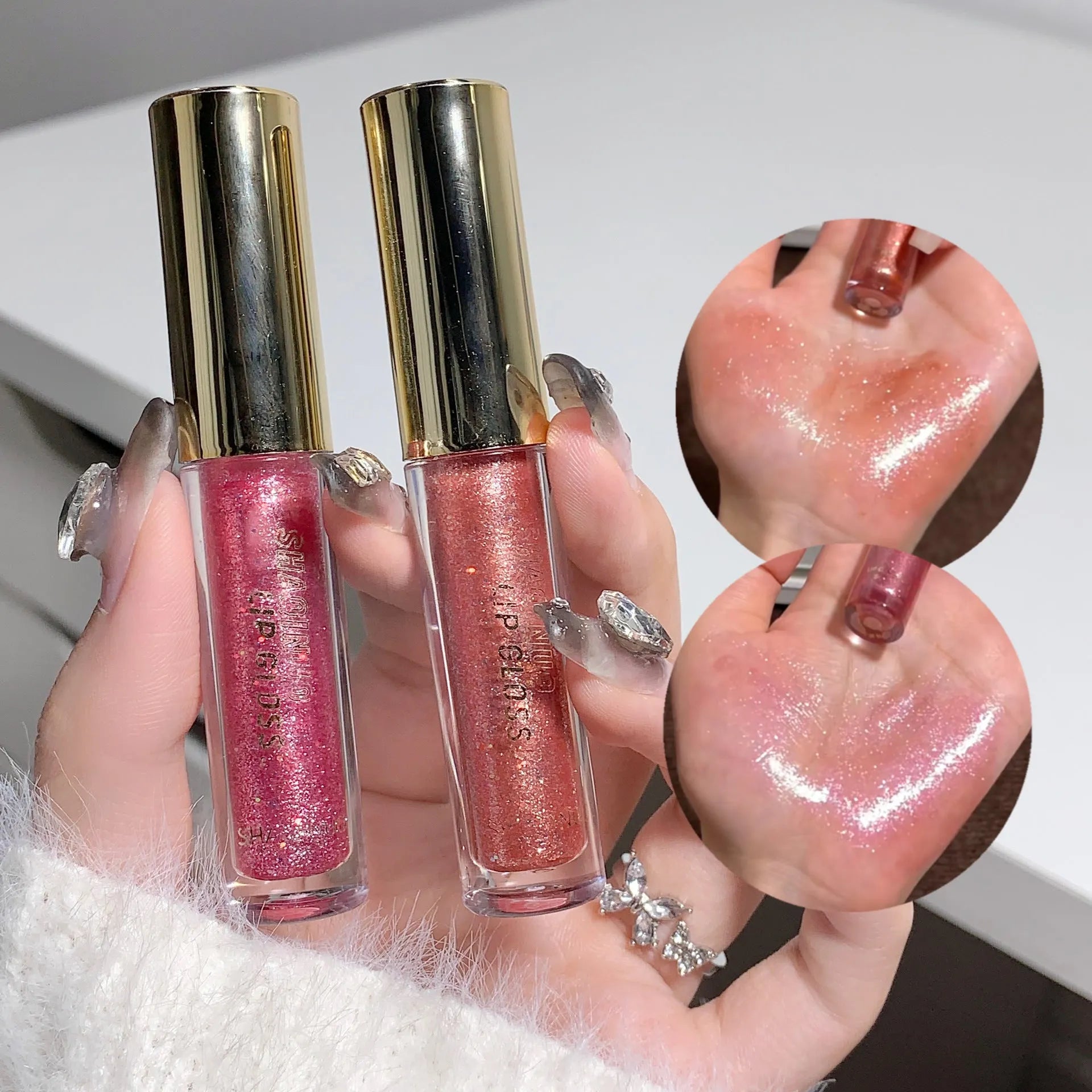 Moisturising lip gloss tube showing reflective finish in choice of five colours: pink, gold, peach, purple, and red.