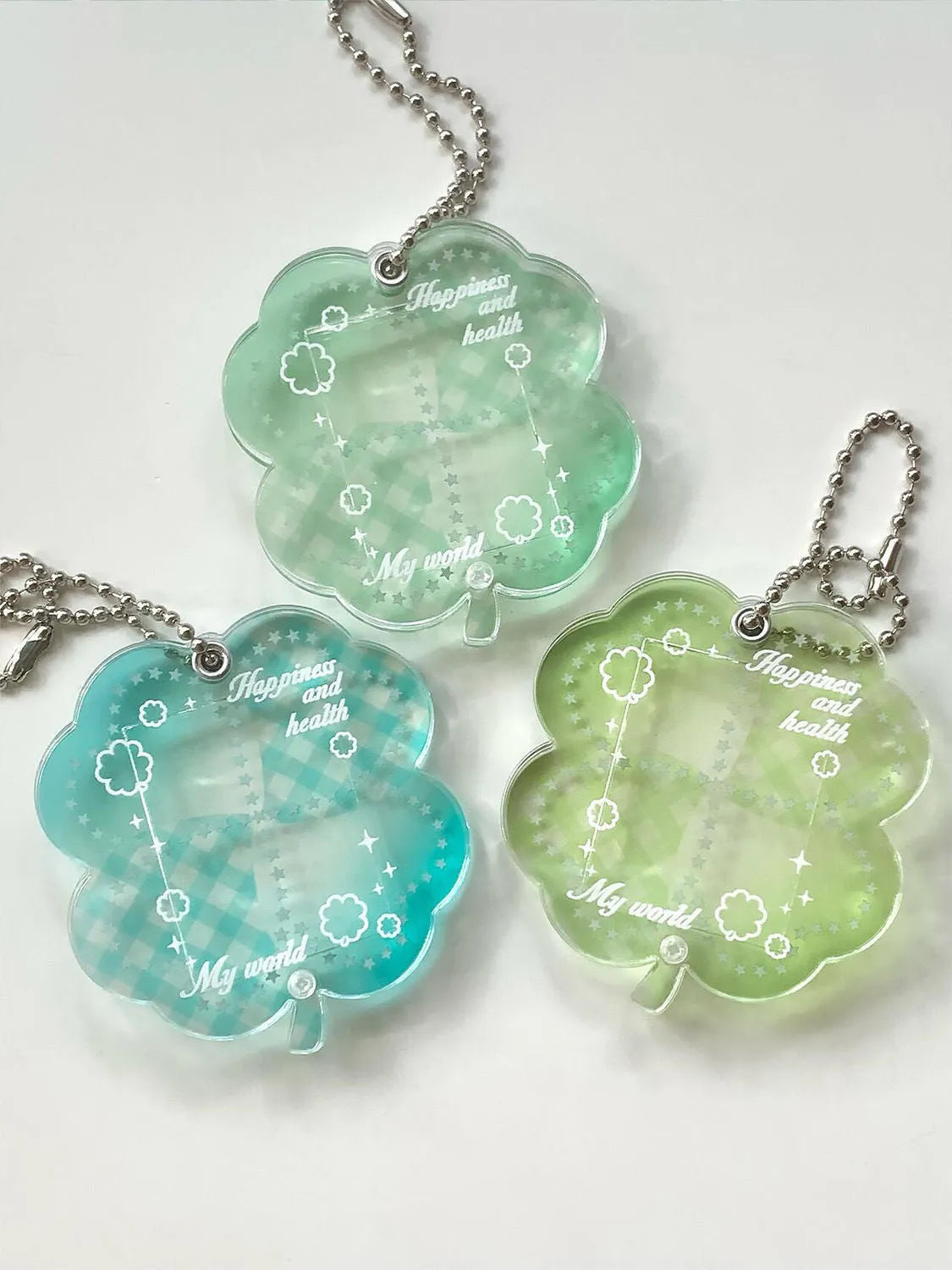 Acrylic four-leaf clover pendant bag lanyard phone keychain in three colours: elegant blue, grass green, mint green
