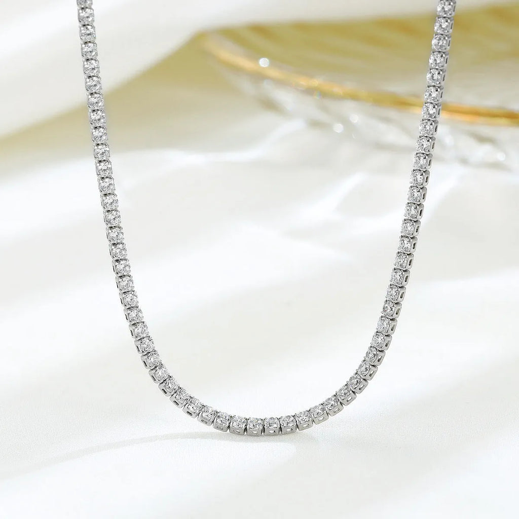 Women's sterling silver necklace with round design and diamond treatment on 925 silver chain