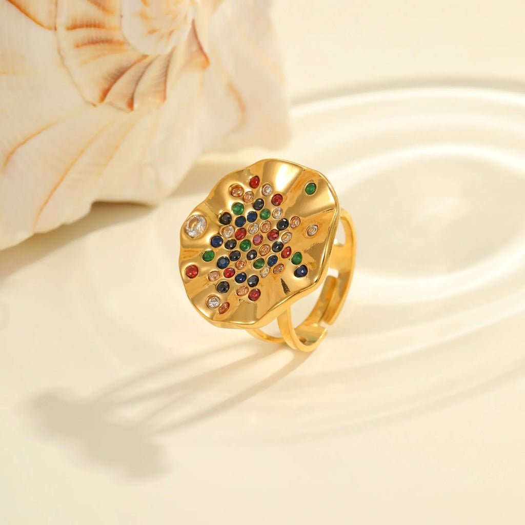 Geometric open mouth ring with pleated inlaid diamond detailing in electroplated stainless steel
