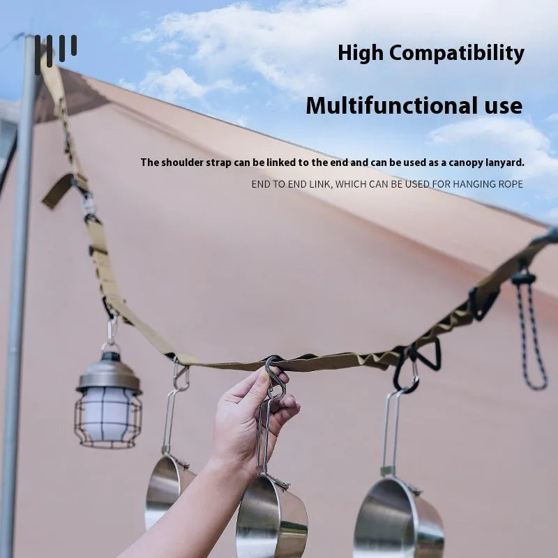 Black 130cm long woven rope hanging strap shown coiled, for use as a clothesline or storage belt.