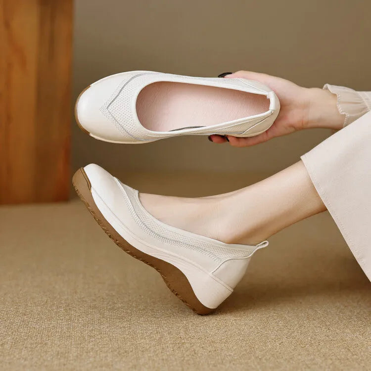 Beige cowhide leather platform slip-on pumps with round head and thick sole on white background