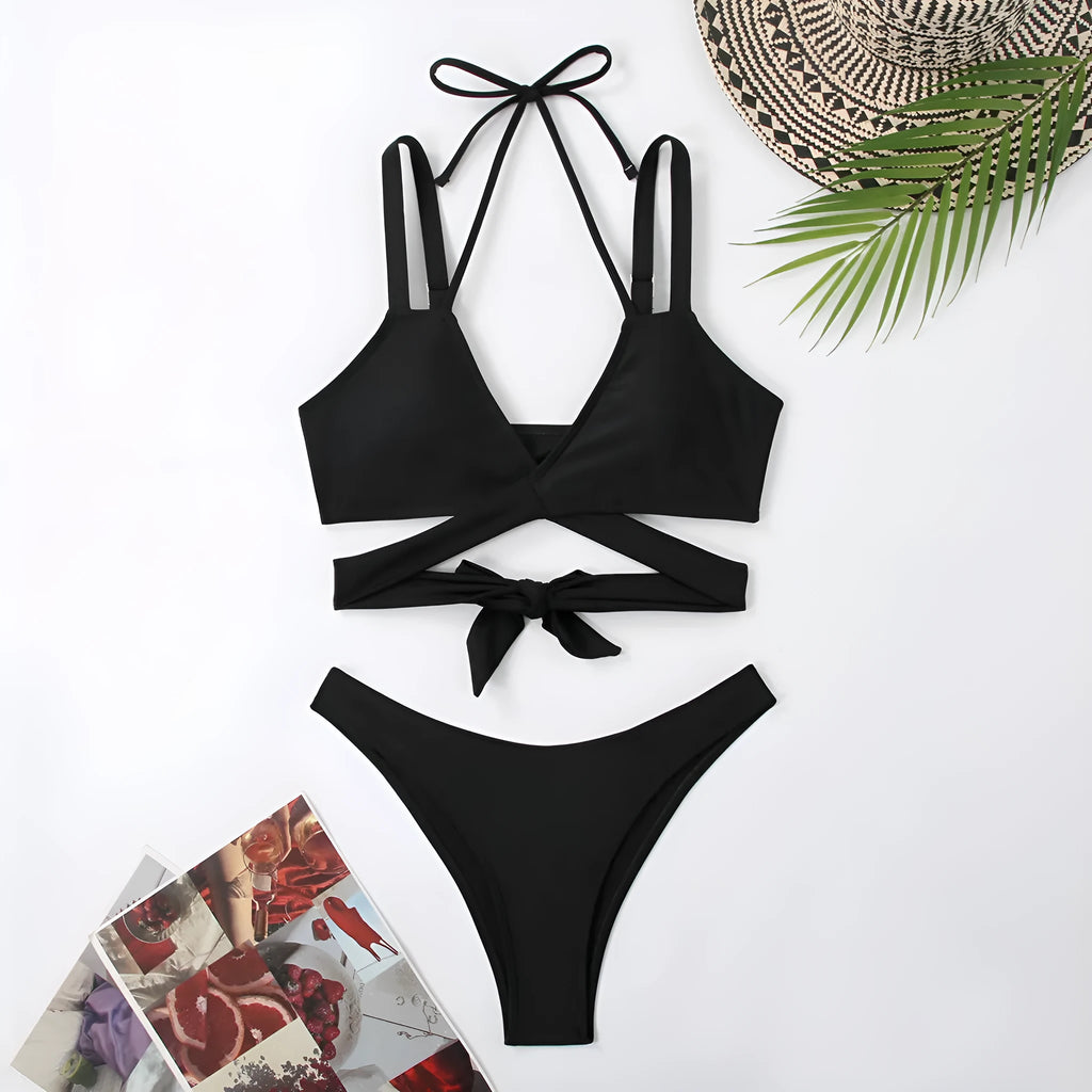A solid colour women's bikini swimsuit with straps, shown in one of five available colours.