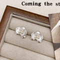Retro style flower earrings with petal design in gold or silver colour on copper base
