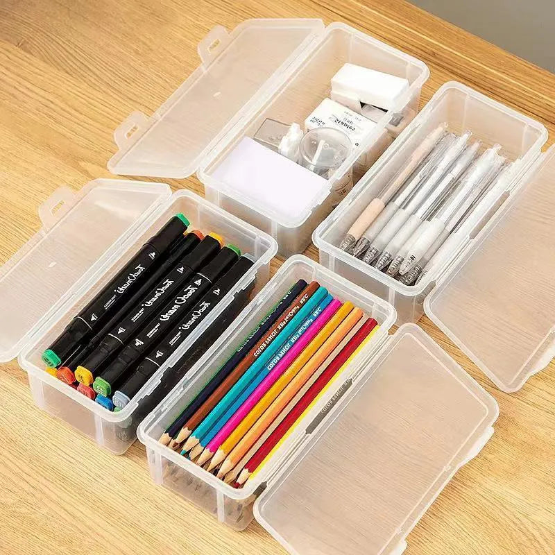 Transparent pencil storage box showing organised stationery including pencils and art supplies