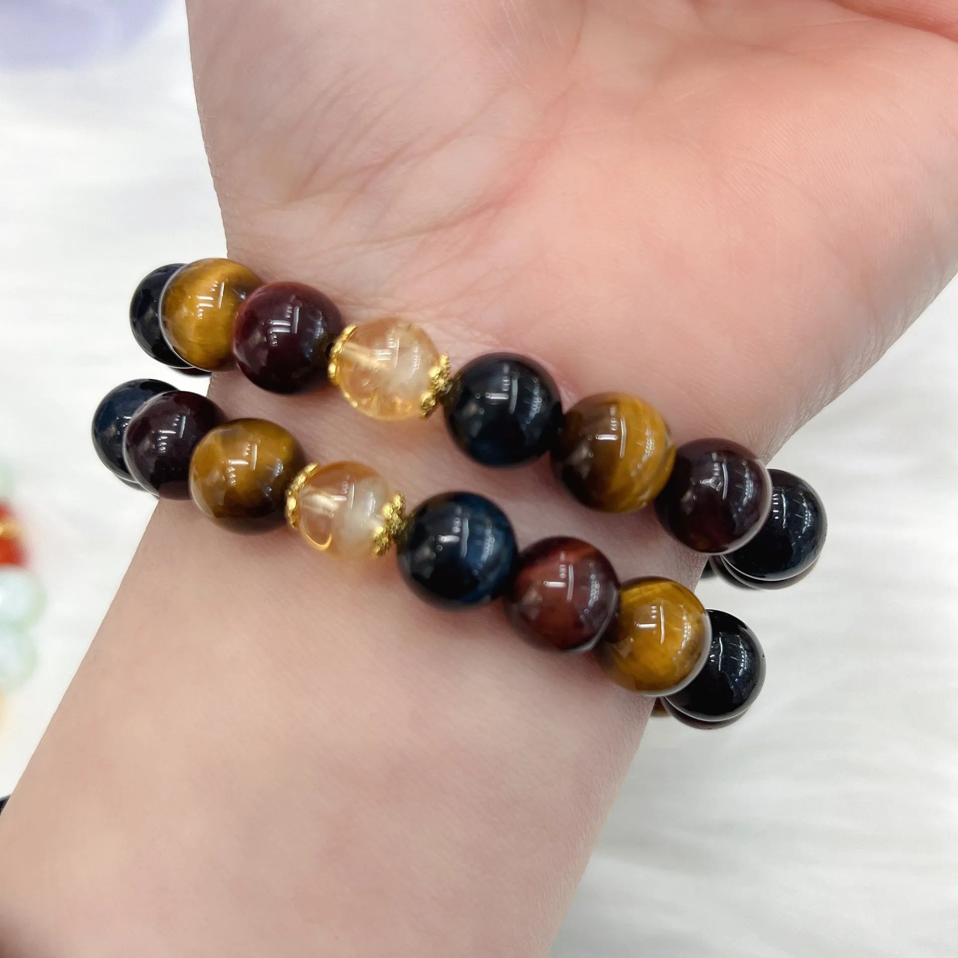 Natural colour tiger eye stone bead bracelet with maillard chain showing 18cm adjustable length