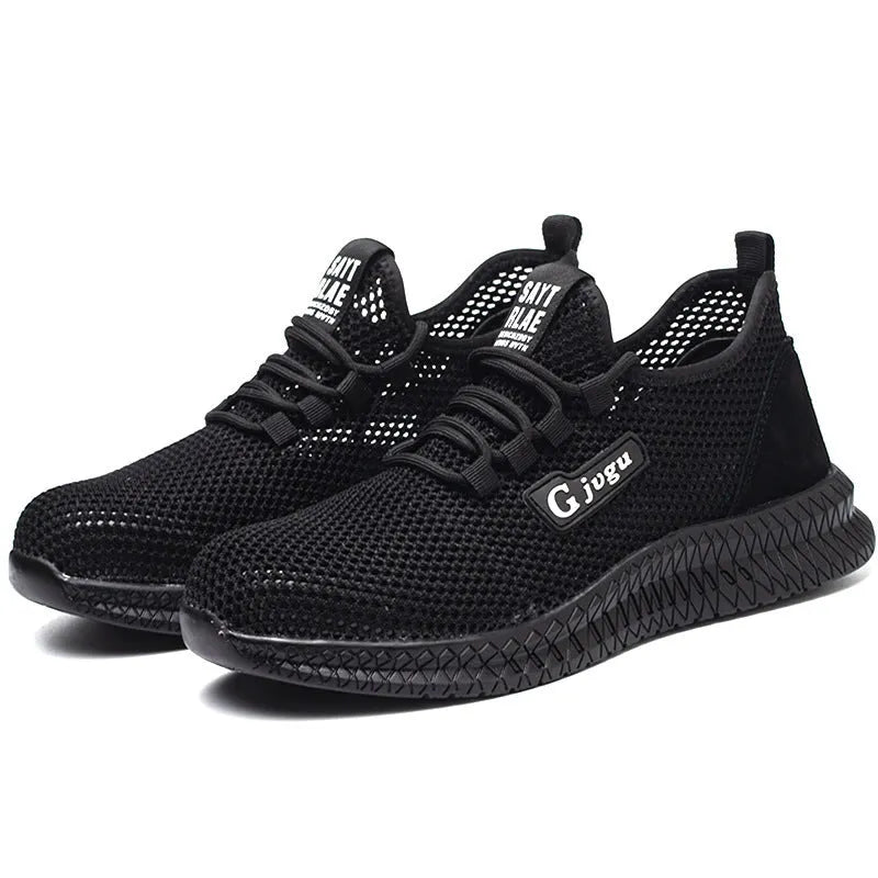 Men's black Flyknit work shoes with steel toe caps showing low-top safety footwear design