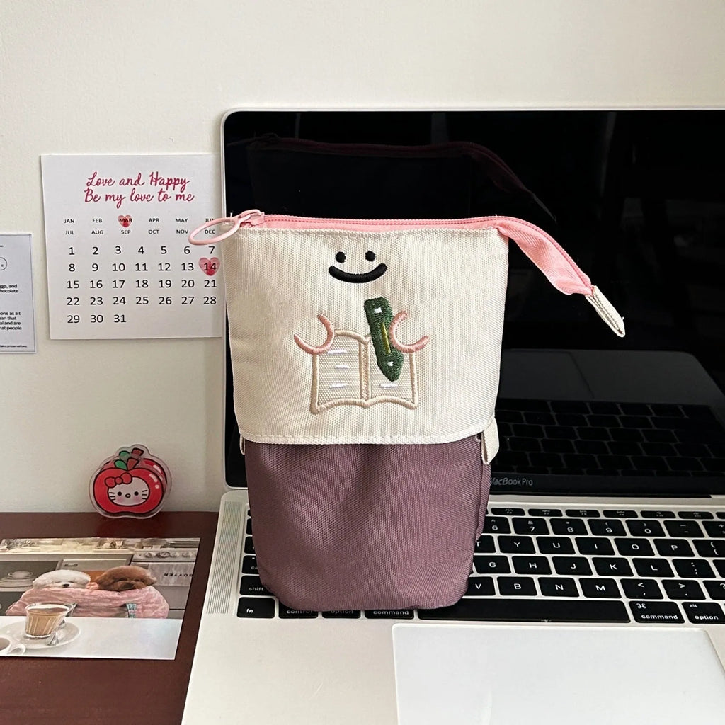 Cartoon Korean style collapsible pencil case in Oxford fabric measuring 17cm by 14cm
