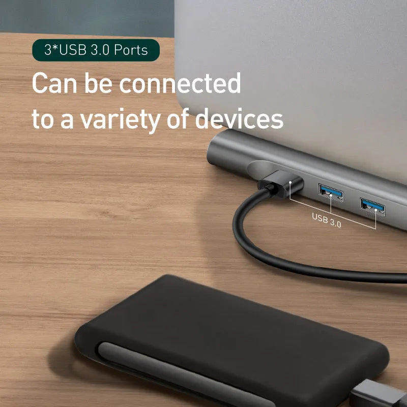 Grey aluminium alloy USB C docking station with ten ports and an integrated cooling bracket.