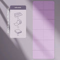Purple folding TPE yoga mat, shown both fully unfolded and folded into six sections.