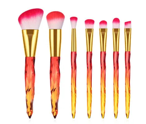 Set of ten clear crystal handle makeup brushes with diamond shank detail and artificial fibre bristles.