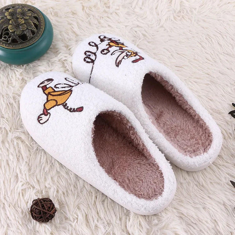 White fluffy cartoon slippers with a thick rubber non-slip sole and a toe holder strap.
