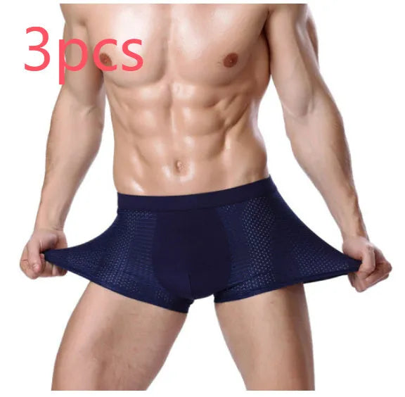 Men's solid colour modal boxer briefs with a U convex design on a mid waist.