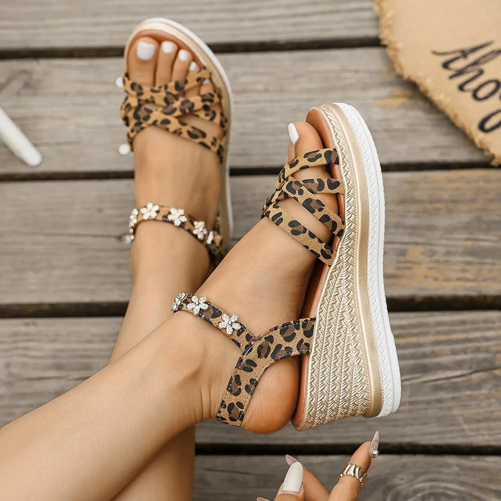 Light brown suede women's platform sandals with ankle buckle and open toe on a white background.