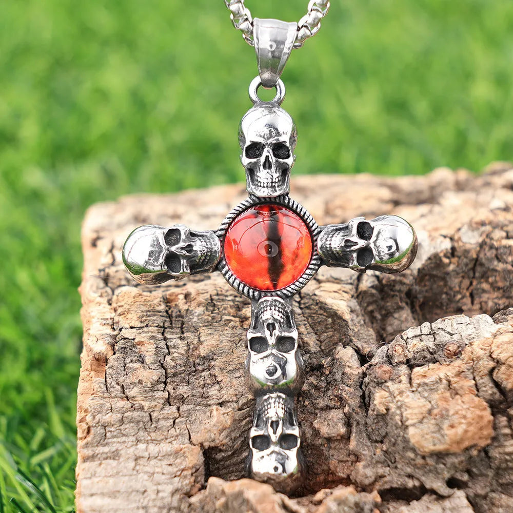 Stainless steel skull red eye cross pendant necklace with polished finish on 60cm square pearl chain, steel colour
