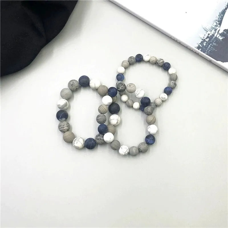 Handmade men's bracelet with planet stone starry design in U-shape, showing bead size options.