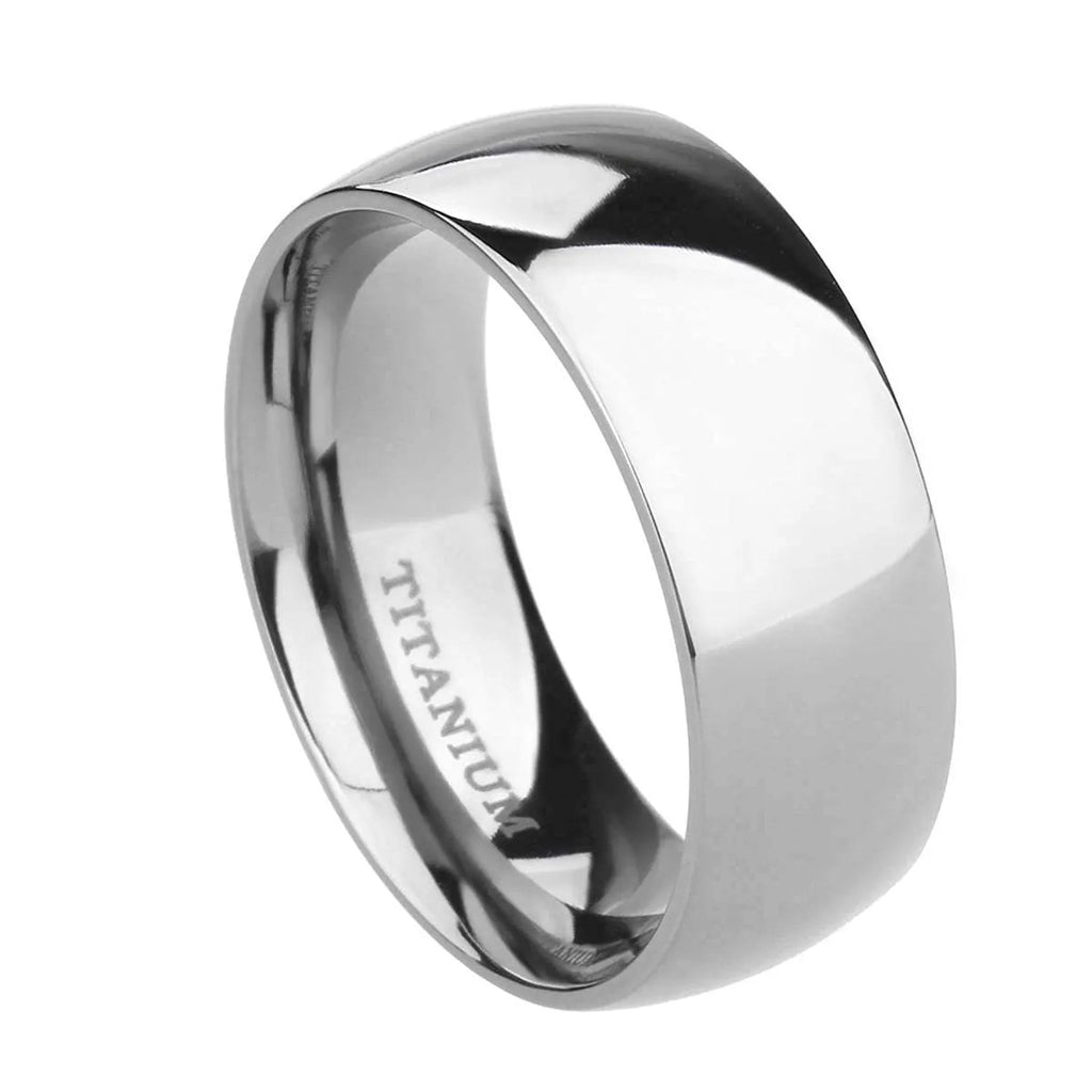Polished silver titanium ring showing different width options on a finger.