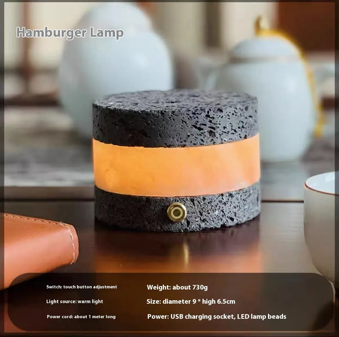 Small orange volcanic rock touch lamp with USB port and essential oil well in warm white.