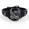 Black leather bracelet with a geometric alloy eagle watch-buttom decoration.
