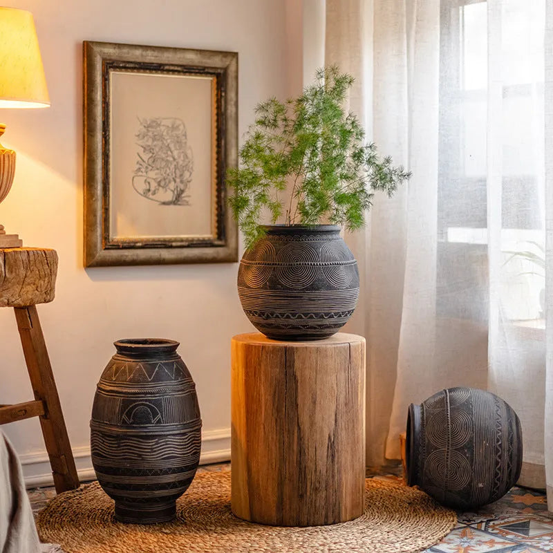 African art cement flower pot with textured finish and drainage holes for indoor outdoor plants