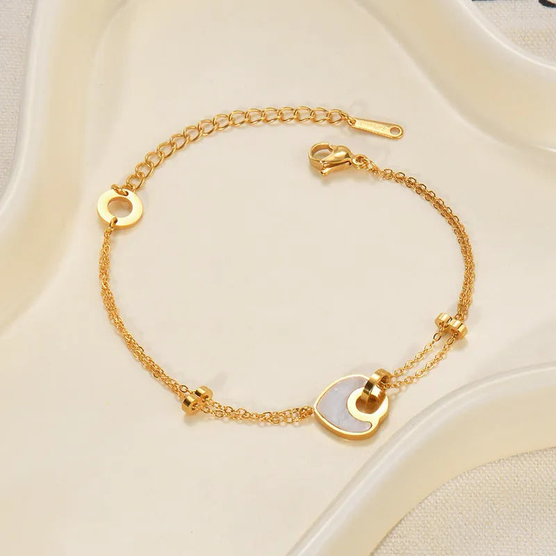 Women's ins style stainless steel bracelet with a double-layered electroplated resin heart charm