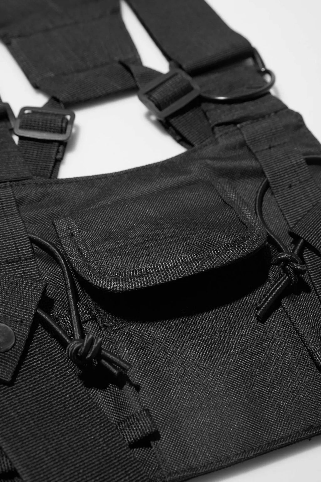 Black tactical tooling chest bag for men with Oxford cloth, striped pattern, and nylon lining