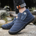 Men's waterproof snow boots in black with non-slip rubber sole and plush lining